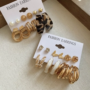 Detail view of 12-piece fashion earring set with butterflies, pearls, and crystals