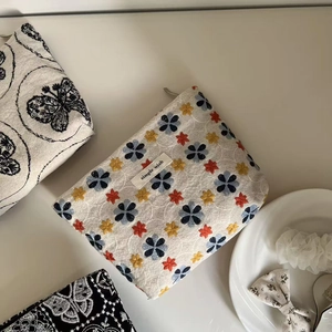 Minimalist cotton linen makeup bag with vintage floral embroidery and simple wish label