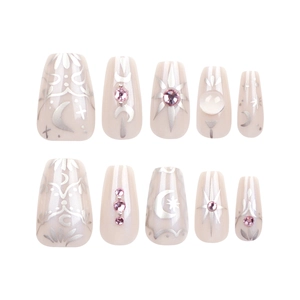 Star and moon motif press-on nails in pearly light pink with rhinestones and pearls