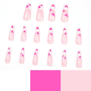 Long coffin fake nails with light pink French base and bright pink heart patterns