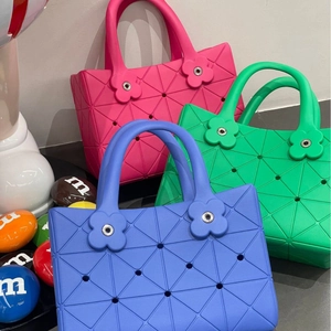 Pink green and blue EVA tote bags with geometric triangle pattern for beach and summer