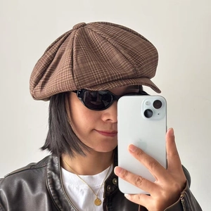 Brown plaid newsboy cap for women featuring a retro vintage checkered pattern design