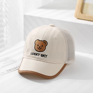 Detail of baby baseball cap with lucky bear embroidery and breathable mesh texture