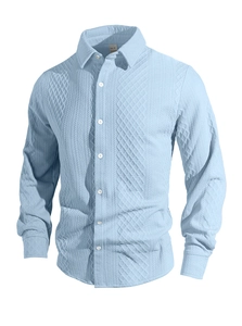 Close-up of light blue knit shirt collar with size M label and textured jacquard fabric