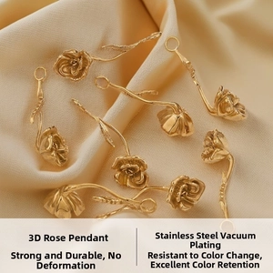 Detailed view of 3D rose flower pendants in 18K gold-plated stainless steel on silk