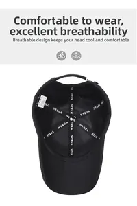 Interior view of black cotton baseball cap showing reinforced seams and breathable fabric