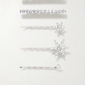 Elegant silver hair clips set with sparkling rhinestones and snowflake patterns
