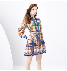 Close-up of baroque floral print dress with lantern sleeves and belted waist detail