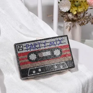 Retro cassette clutch bag with colorful rhinestones and A PARTY MIX lettering detail