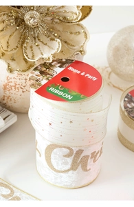 Close-up of champagne velvet Christmas ribbon with gold glitter Merry Christmas text