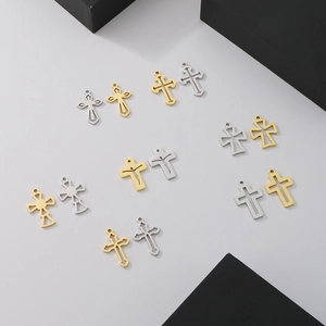 Various hollow stainless steel cross pendants in gold and silver finish for DIY jewelry