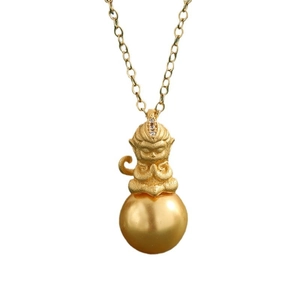 Golden Monkey King pendant necklace with polished bead and matte finish details