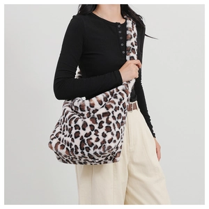 Detail of leopard print faux fur hobo bag showing soft texture and large capacity