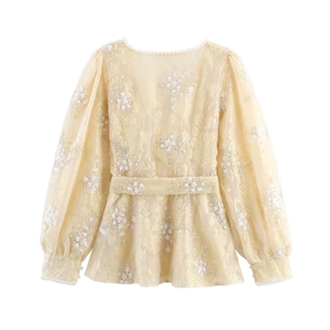 Elegant champagne V-neck sequined blouse with floral embroidery and pearl trim