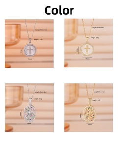 Macro detail of cross and tree of life pendants in gold and silver with cubic zirconia