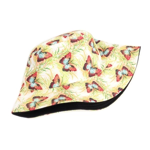 Detail view of double-sided bucket hat with colorful butterfly prints on yellow canvas