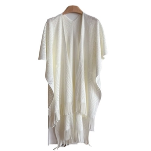 Elegant off-white knit shawl cardigan with V-neck design and delicate fringe tassels