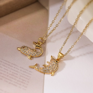 Exquisite gold-plated dolphin pendant necklace with shimmering white zircon stones