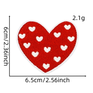 Detailed macro view of heart embroidery patch with precise stitching and dimensions