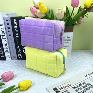 Cute quilted plush pencil case in purple and yellow with soft square grid pattern design