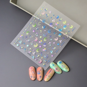 3D embossed nail stickers featuring macaron stars and moons with colorful rhinestones