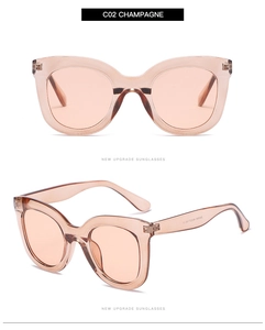Detail view of champagne cat-eye sunglasses featuring CE markings and frame dimensions