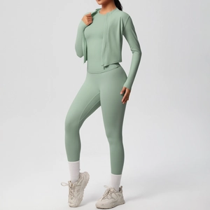 Three-piece yoga set featuring a zip-up jacket and high-waisted leggings in mint green