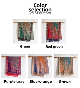 Five color options of ethnic paisley shawls with fringes on wooden display rod