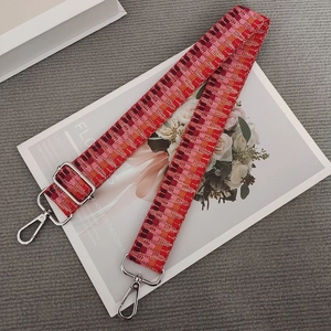 Adjustable woven shoulder strap for handbags with vintage red geometric pattern and silver hooks