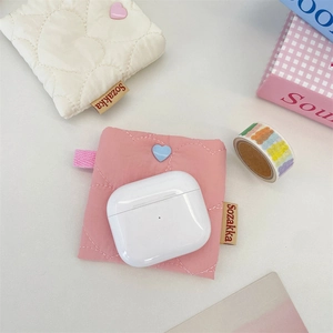 Detailed view of quilted heart pattern storage bags for earphones with cute heart clips