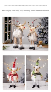 Décoration de renne en peluche de Noël avec écharpe en tricot et lumières LED pour fêtes.