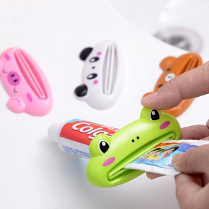 Set of 4 cute cartoon animal toothpaste squeezers including pig, panda, bear and frog