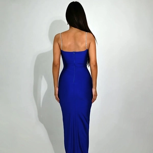 Detail of royal blue dress with rhinestones on straps and invisible back zipper