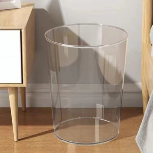 Minimalist transparent round waste bin made of high-clarity acrylic for bedroom usage