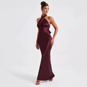 Detailed view of backless cross-halter neckline on a deep wine red satin maxi dress