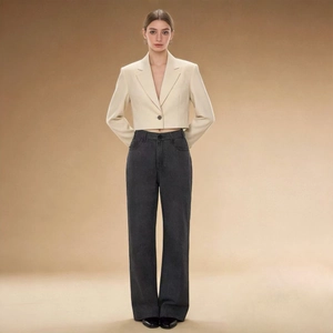 Front full-body view of dark grey high waist wide leg denim jeans with cream blazer
