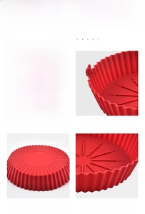 Detail of red air fryer silicone liner featuring oil drainage grooves and heat-resistant handles