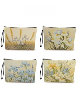 Detail display of four floral makeup bags featuring iris patterns and zipper closures