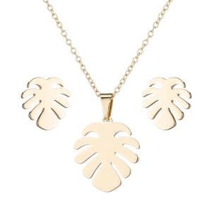 Golden monstera leaf jewelry set with minimalist pendant necklace and stud earrings