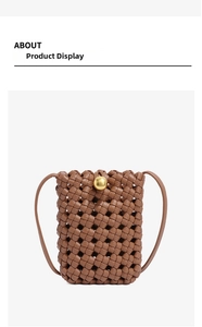 Close-up of brown woven crossbody phone bag featuring a golden spherical metal clasp