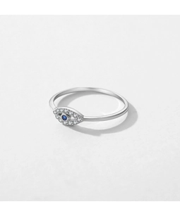 Macro detail of S925 sterling silver evil eye ring with blue stone and white crystals