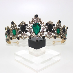 Vintage gold bridal crown with green and black gemstones and sparkling crystals