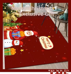 Close-up of red Christmas doormat with Santa and reindeer motifs on wooden floor