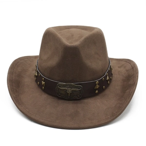 Detail of dark brown suede cowboy hat with vintage bull head buckle and brass metal studs