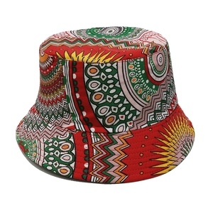 Close-up of bohemian bucket hat with colorful geometric patterns and woven texture
