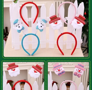 Detailed views of four festive Christmas spring headbands featuring Santa, bear, and snowman