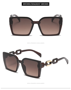 Detail view of brown square sunglasses with gradient lenses and stylish chain temples