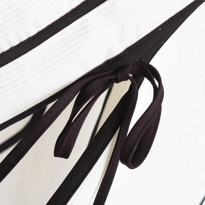 Women's chic contrast tie-front jacket with white striped fabric and black piping detail