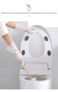 Detail view of durable long-handle toilet brush and waterproof household gloves in use
