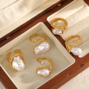 5-piece gold 18k plated stainless steel open ring set with baroque pearls in a jewelry box
